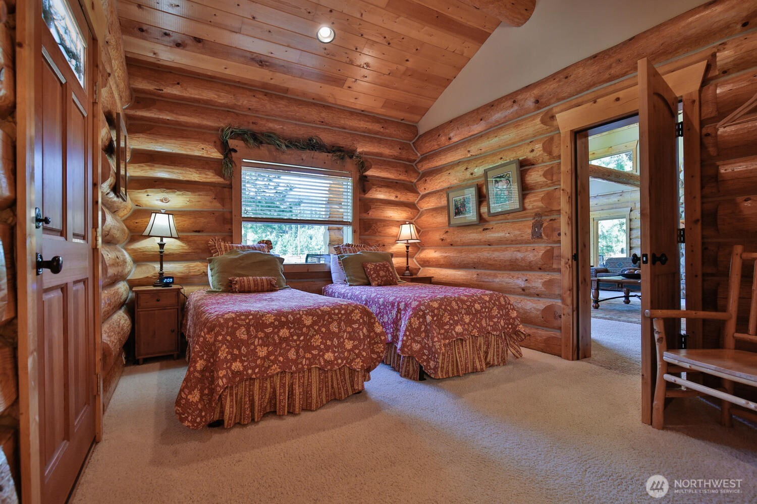 18135 River Road Leavenworth, WA 98826 - Photo 16 of 39 a bedroom with furniture and a window