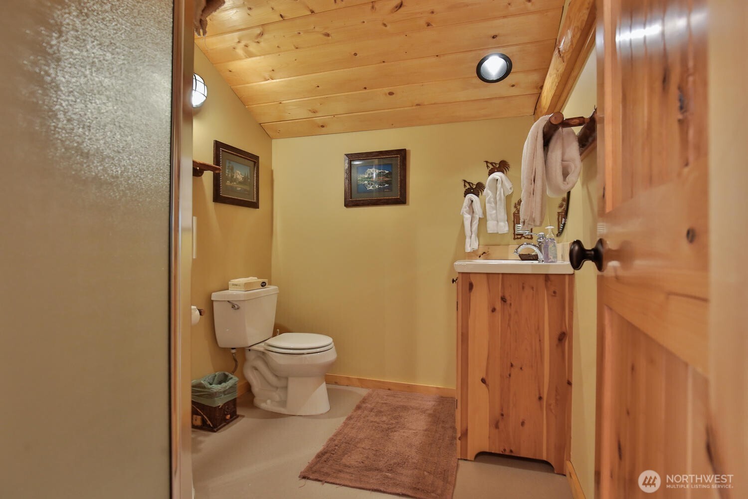 18135 River Road Leavenworth, WA 98826 - Photo 24 of 39 a bathroom with a toilet and a shower