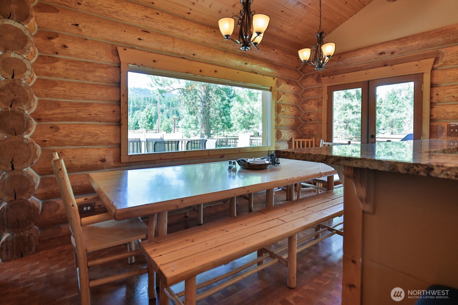 18135 River Road Leavenworth, WA 98826 - Photo 27 of 39 a view of a dining room with furniture window and outside view
