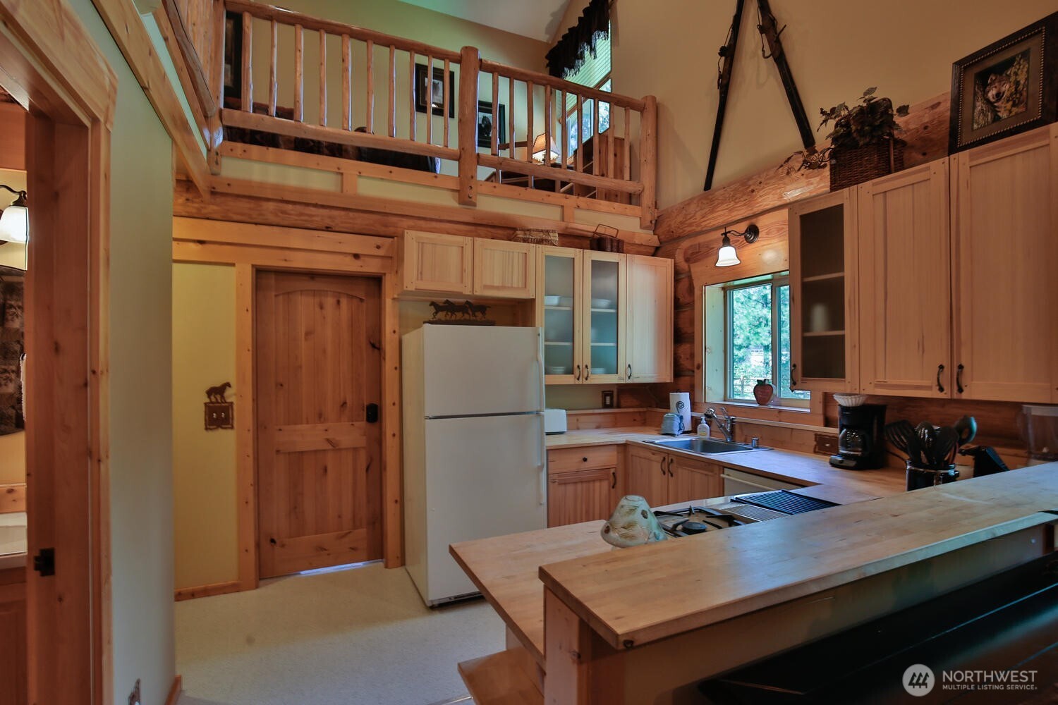 18135 River Road Leavenworth, WA 98826 - Photo 31 of 39 a kitchen with refrigerator and window