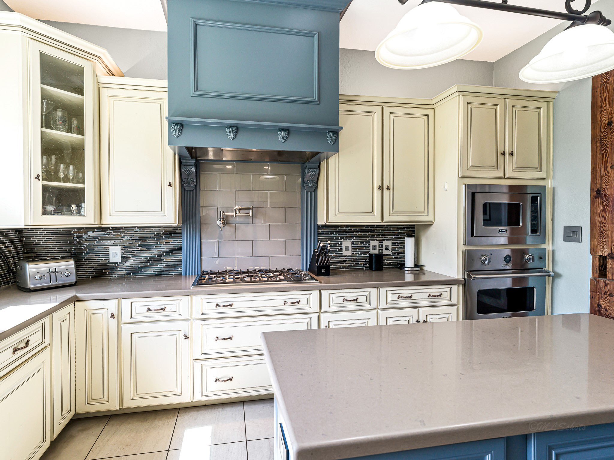 100 Pecan Grove Road Sealy, TX 77474 - Photo 17 of 48 a kitchen with stainless steel appliances a white stove top oven and cabinets