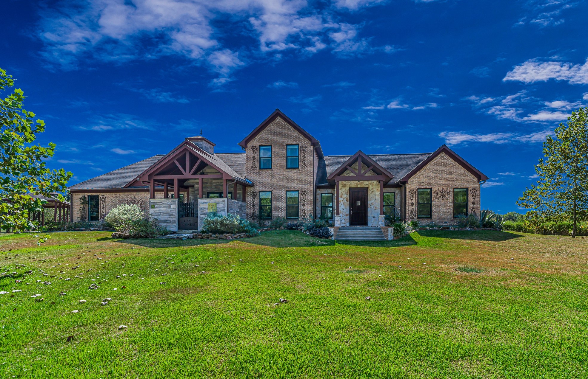 100 Pecan Grove Road Sealy, TX 77474 - Photo 2 of 48 a front view of a house with yard and green space