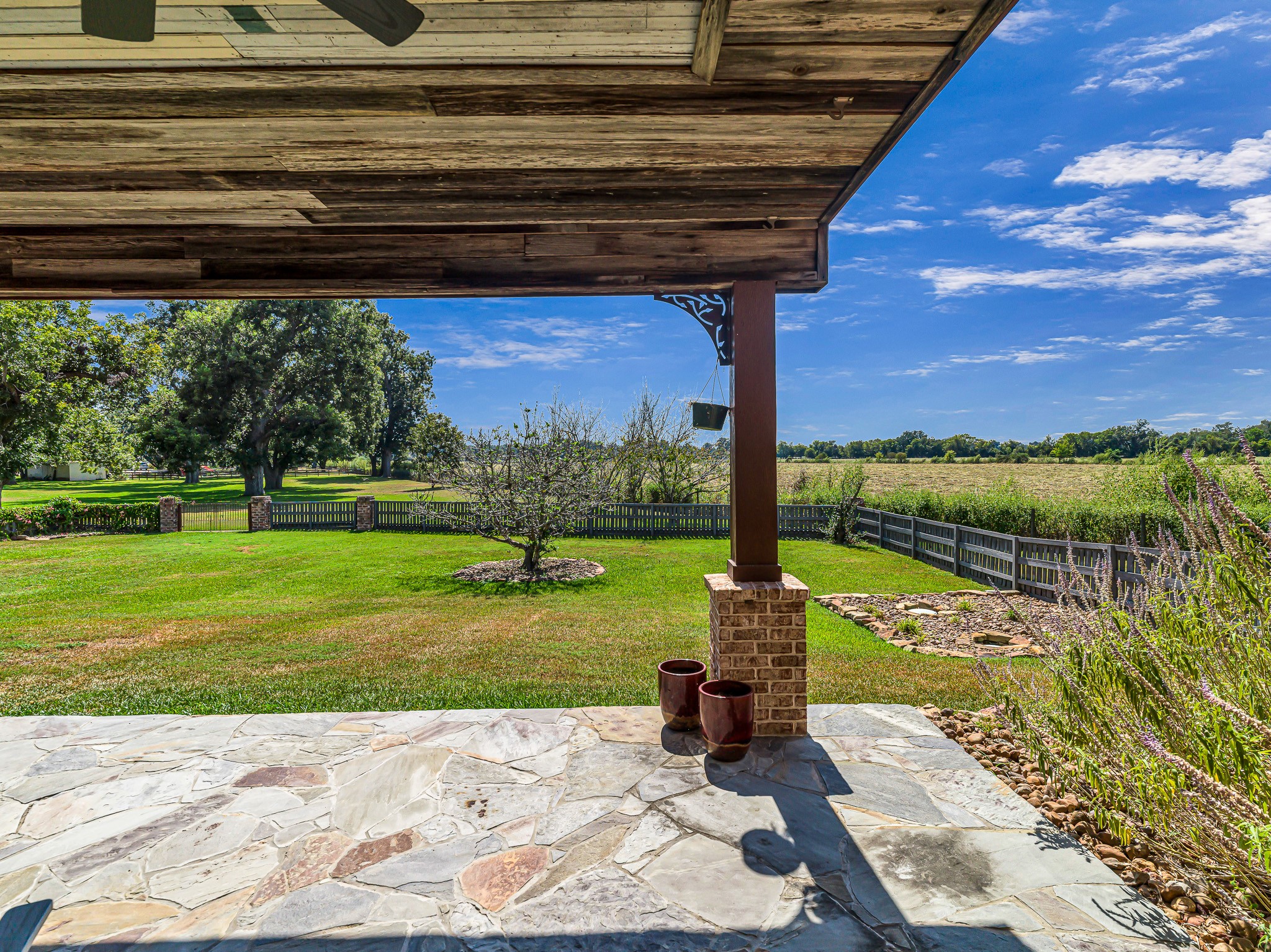 100 Pecan Grove Road Sealy, TX 77474 - Photo 40 of 48 a view of a backyard with a garden