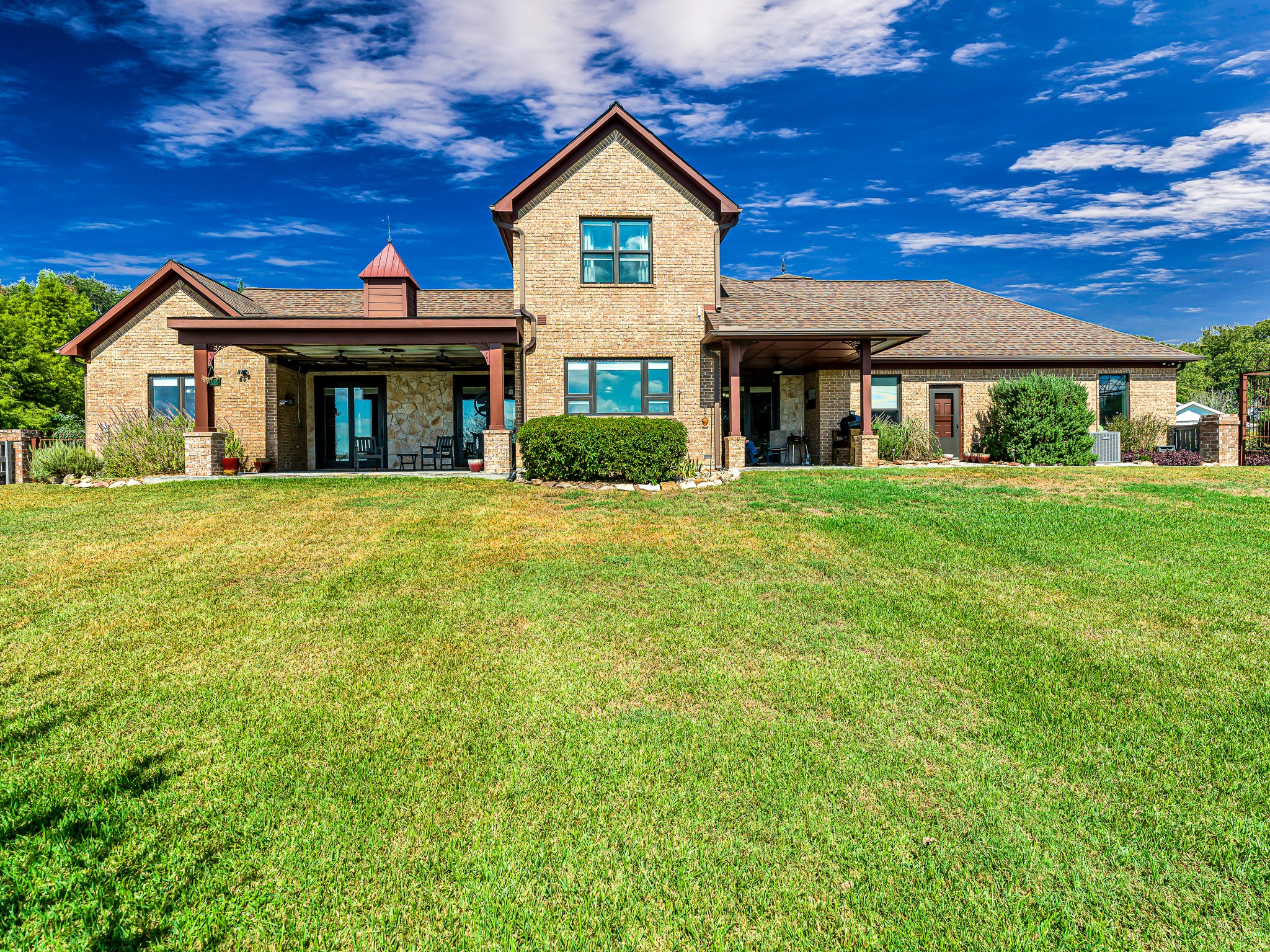 100 Pecan Grove Road Sealy, TX 77474 - Photo 42 of 48 a view of a house next to a big yard and large trees