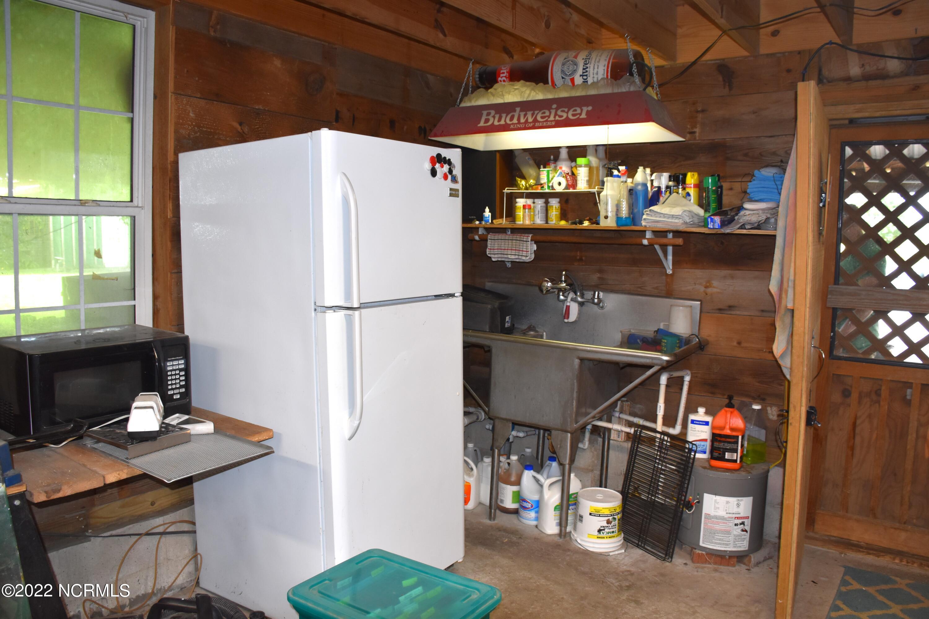 480 Blackbeards View Bath, NC 27808 - Photo 76 of 79 Sink and refrigerator
