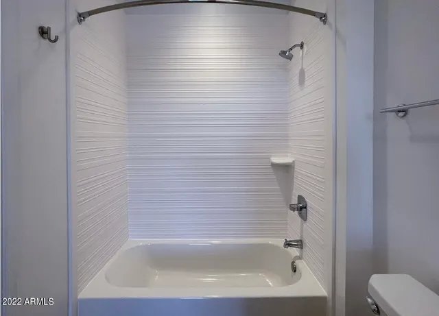 a close up of a bathtub in a bathroom