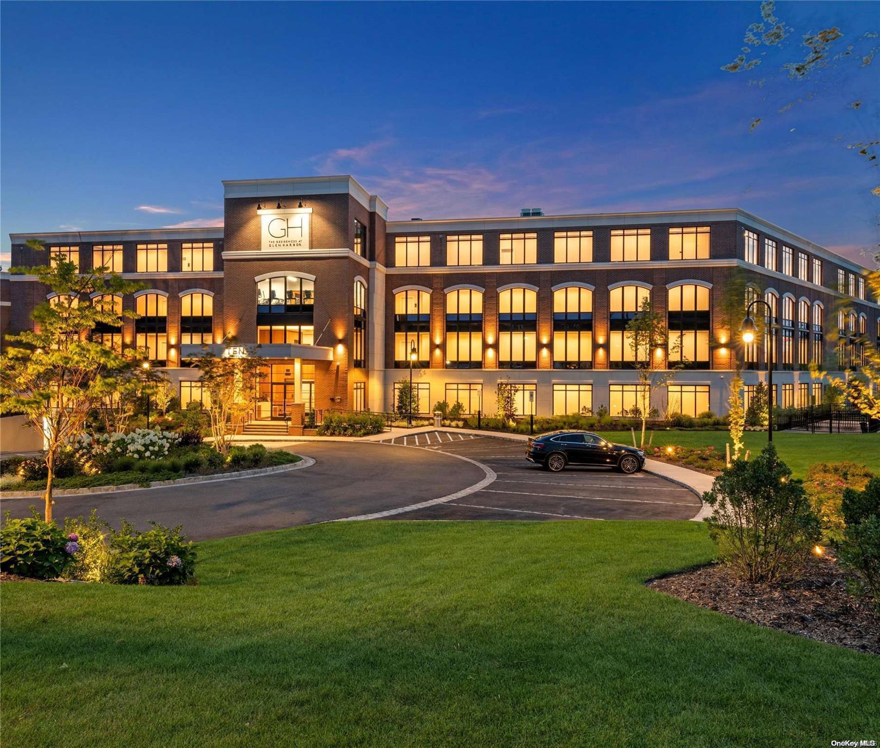 10 Shore Road, Unit 312 Glenwood Landing, NY 11547 - Photo 1 of 1 a swimming pool with outdoor seating and yard