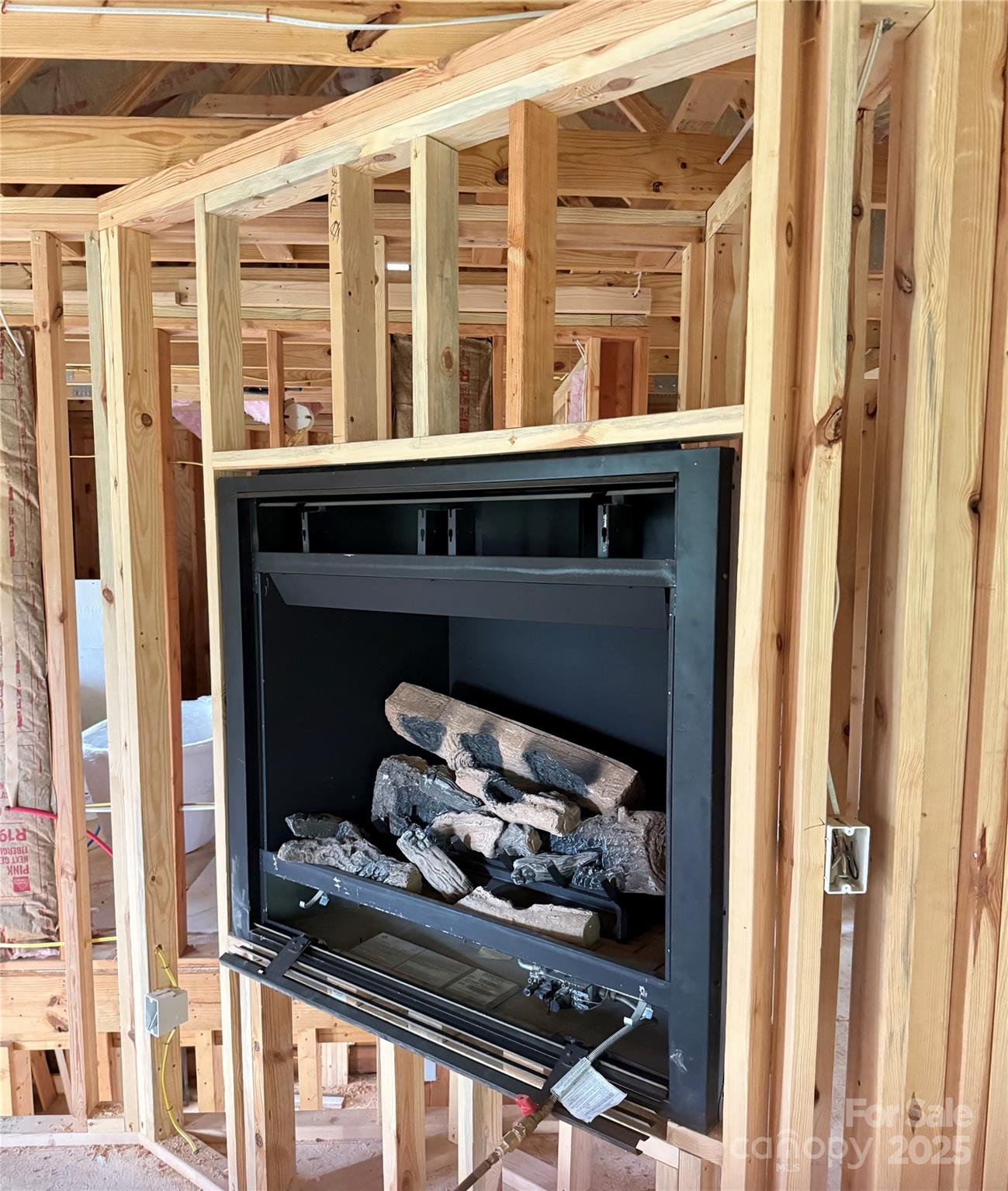657 North Canton Road Canton, NC 28716 - Photo 5 of 6 a room with a fireplace and a window