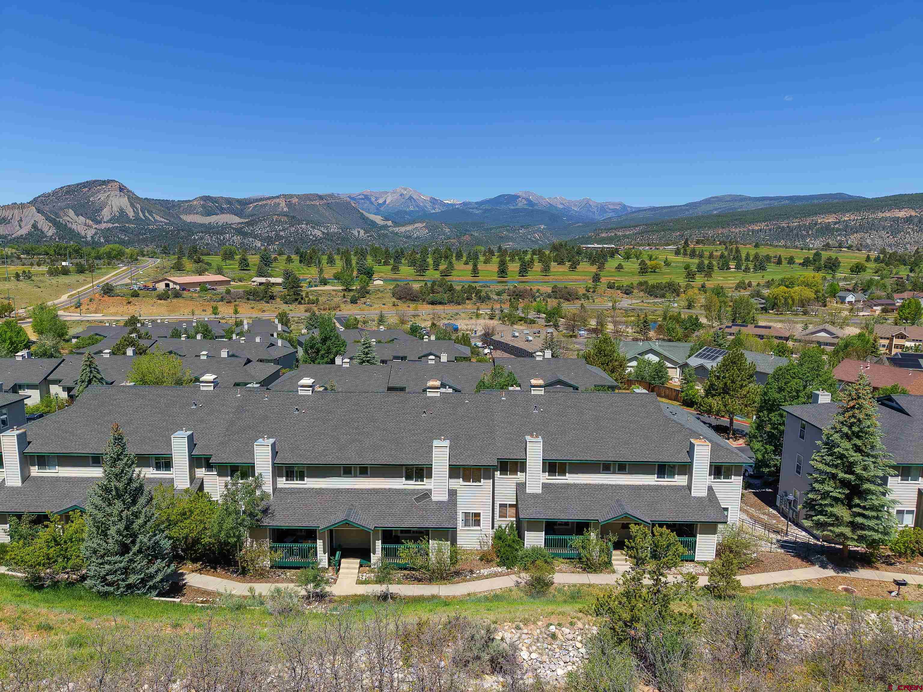 1100 Goeglein Gulch Road, Unit 163 Durango, CO 81301 - Photo 1 of 23 an aerial view of a house with a mountain