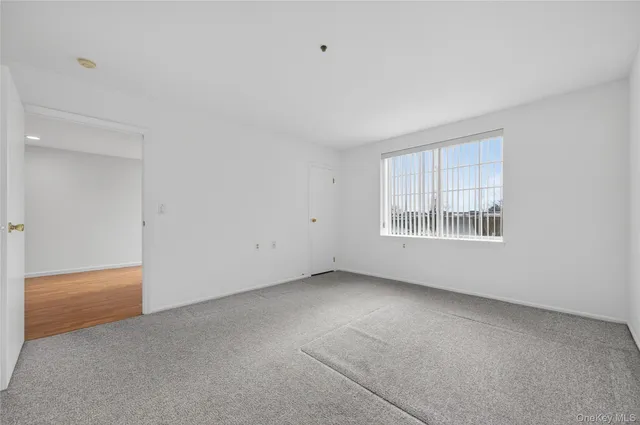 $335,000 | 54 School Street, Unit 205, Westbury, NY 11590