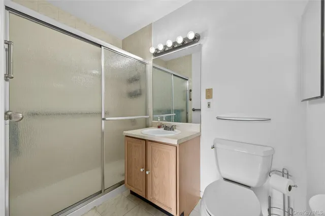 $335,000 | 54 School Street, Unit 205, Westbury, NY 11590