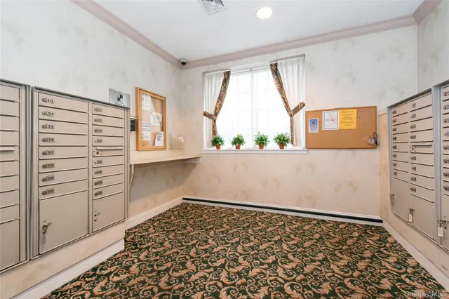 $335,000 | 54 School Street, Unit 205, Westbury, NY 11590