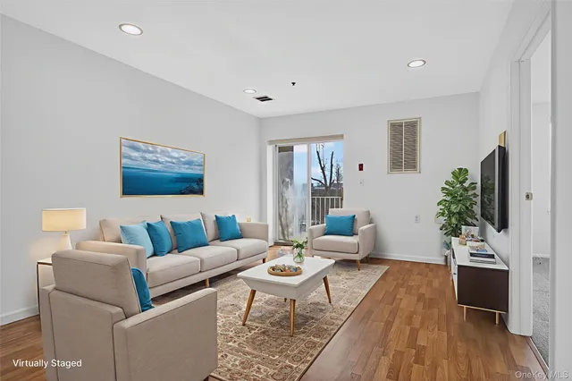 $335,000 | 54 School Street, Unit 205, Westbury, NY 11590