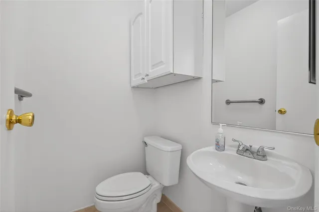 $335,000 | 54 School Street, Unit 205, Westbury, NY 11590