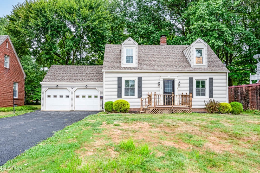 272 Ewing Road Youngstown, OH 44512 - Photo 1 of 19 Front view of home with an attached two car garage with openers.