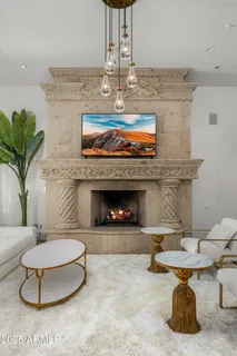 a bedroom with a bed mirror and window