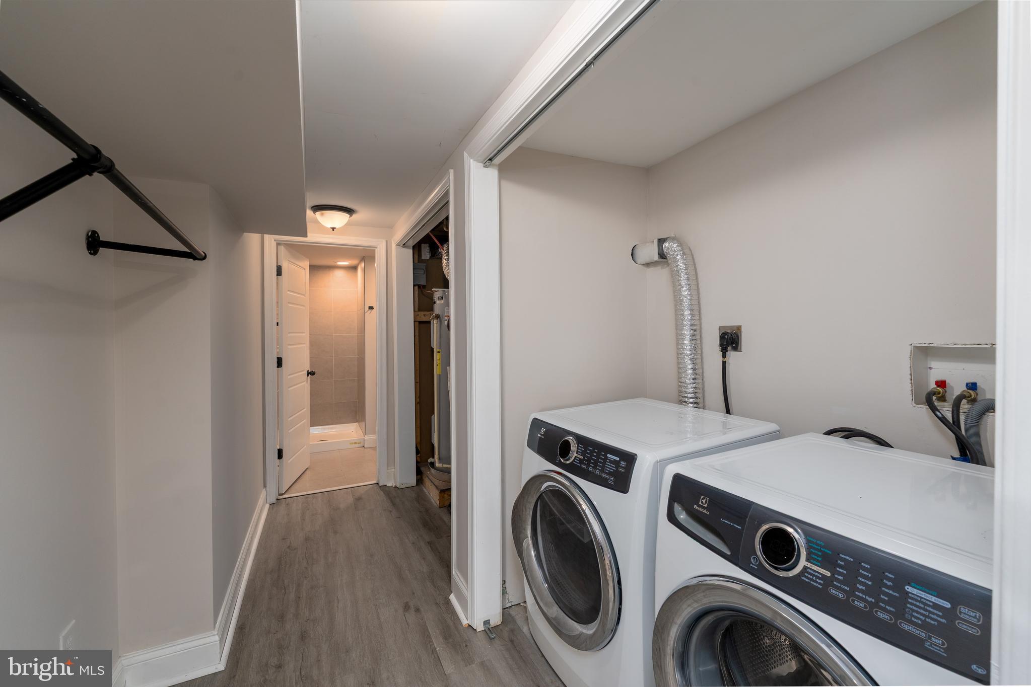 3506 Reisterstown Road Baltimore, MD 21215 - Photo 13 of 32 a view of utility room with washer and dryer