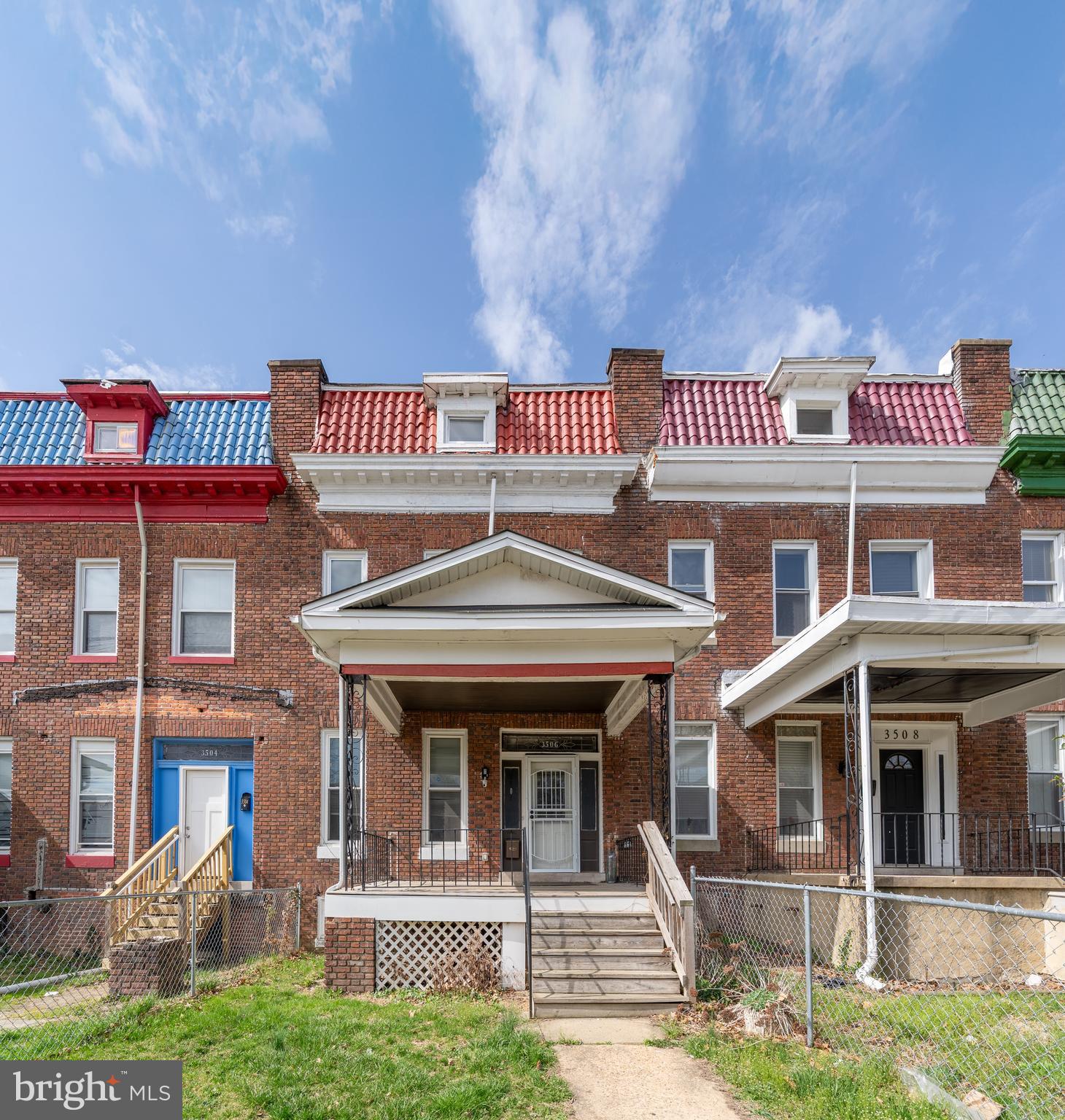 3506 Reisterstown Road Baltimore, MD 21215 - Photo 2 of 32 a front view of a house with a porch