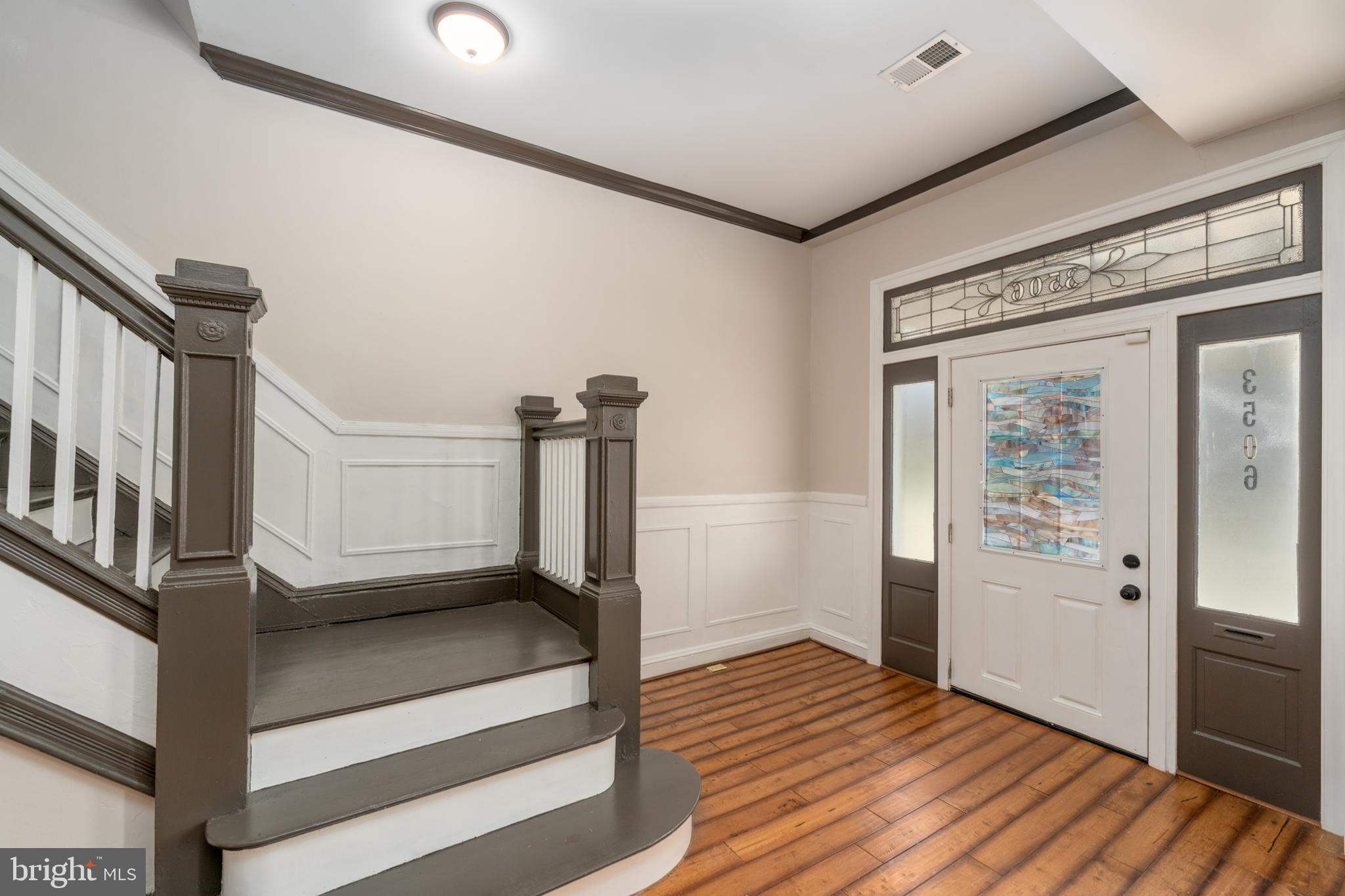3506 Reisterstown Road Baltimore, MD 21215 - Photo 5 of 32 a view of an entryway with wooden floor