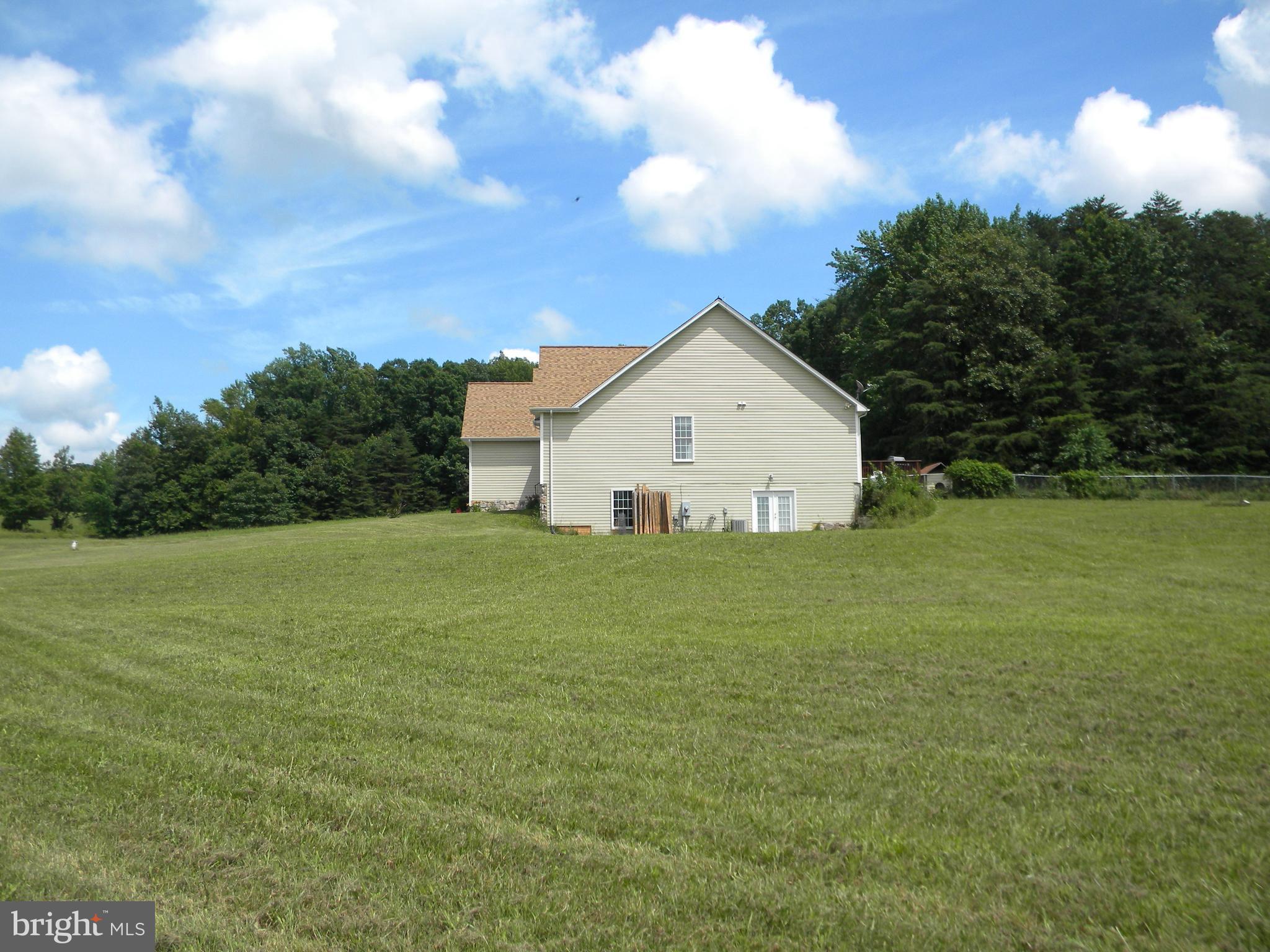 3016 Partlow Road Partlow, VA 22534 - Photo 7 of 30 Look at all that space! Walk out basement!