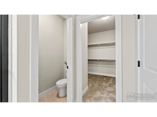 a bathroom with a toilet and a sink