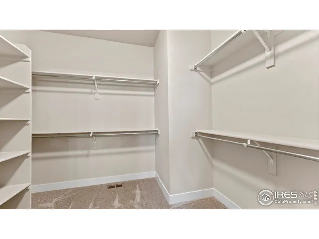 a picture of a room with racks on the wall