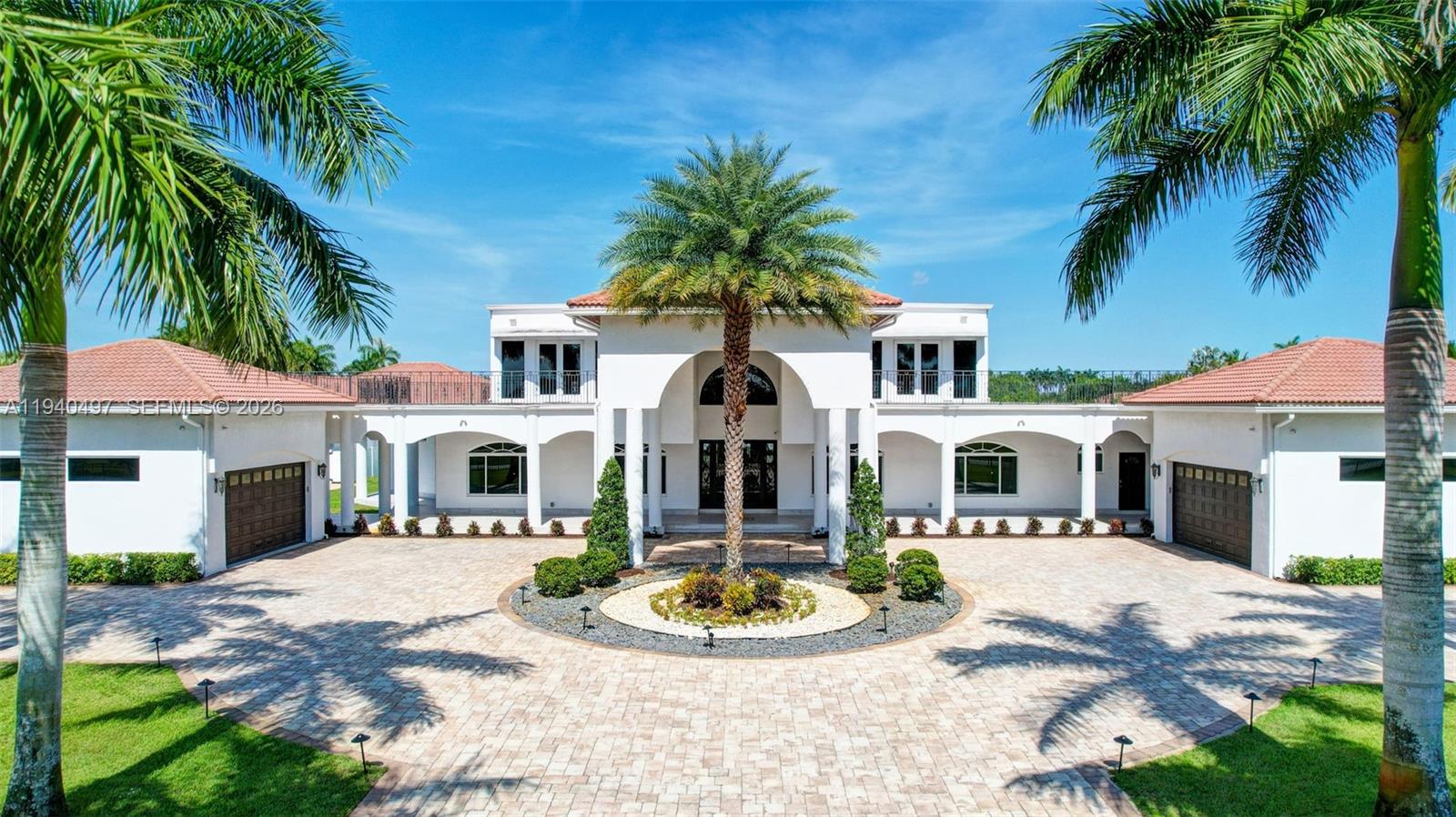 4610 Southwest 178th Avenue Southwest Ranches, FL 33331 - Photo 65 of 100 a front view of a house with yard and tree