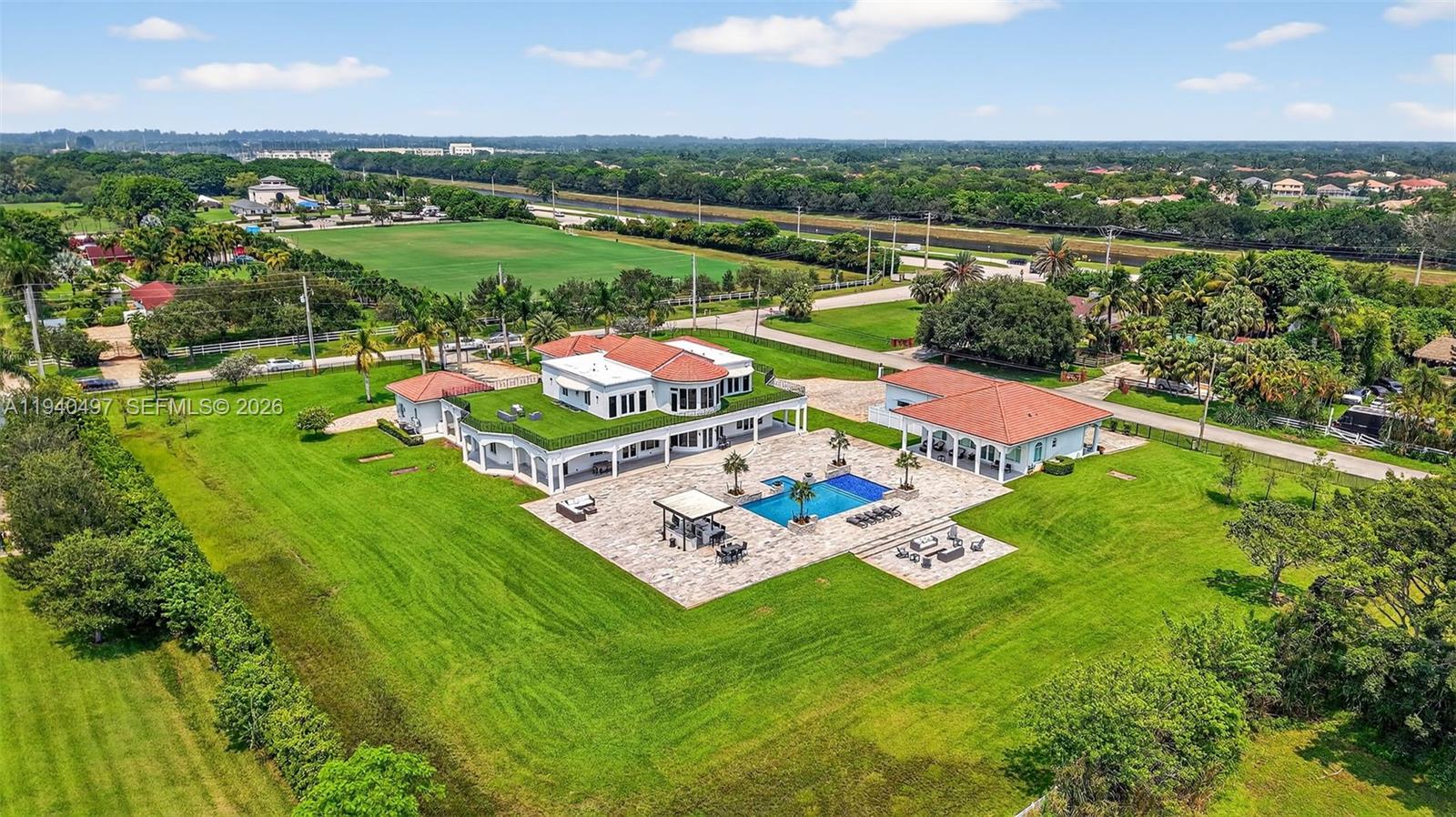 4610 Southwest 178th Avenue Southwest Ranches, FL 33331 - Photo 7 of 100 an aerial view of residential houses with outdoor space and street view
