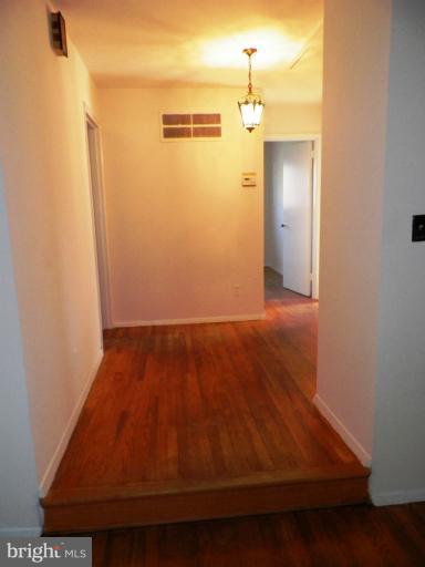 9506 Adelphi Road Silver Spring, MD 20903 - Photo 24 of 30 Hallway leading to bedrooms.