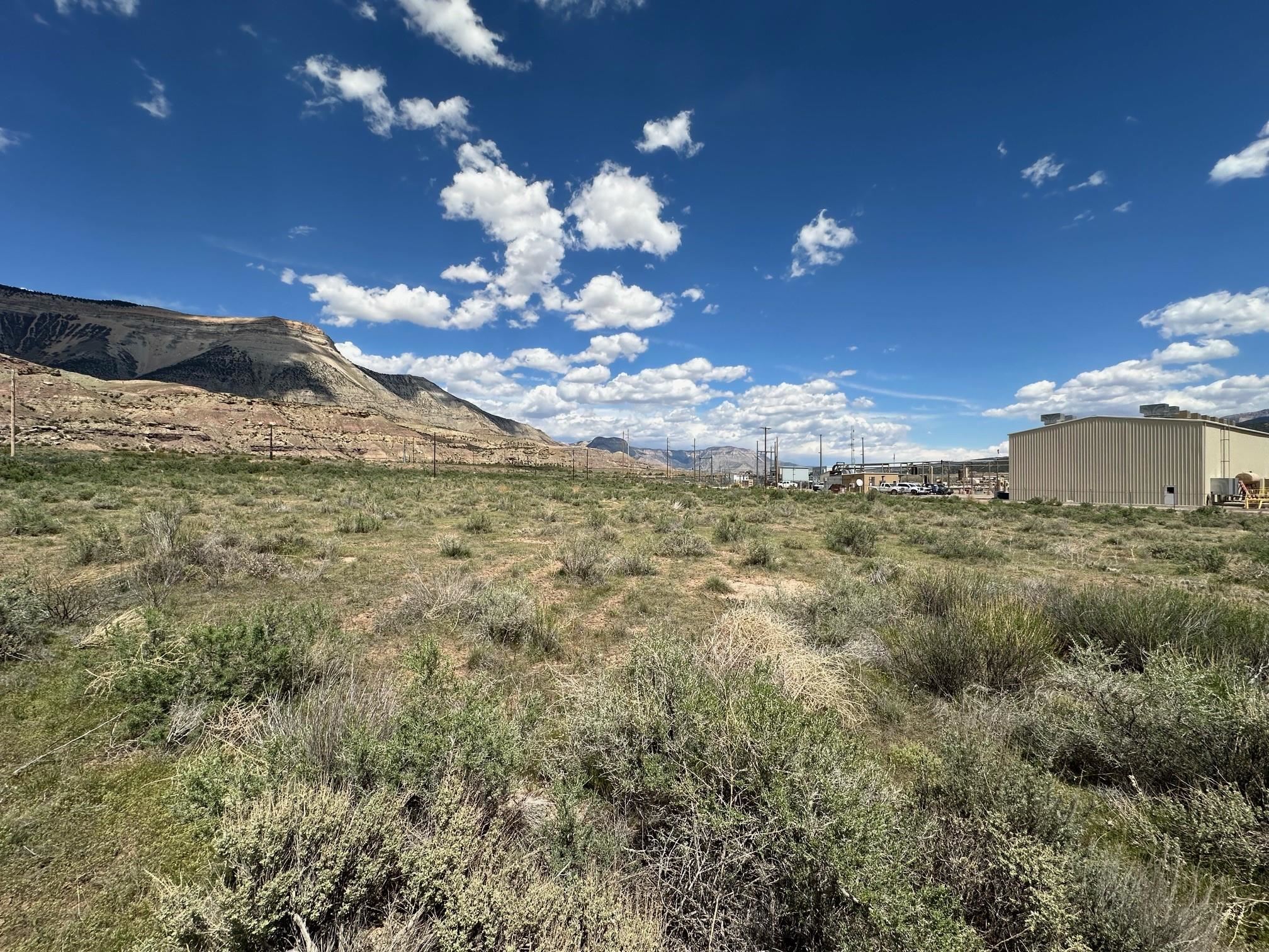 Tbd Tbd Buds Way Parachute, CO 81635 - Photo 2 of 3 a view of a houses with a yard
