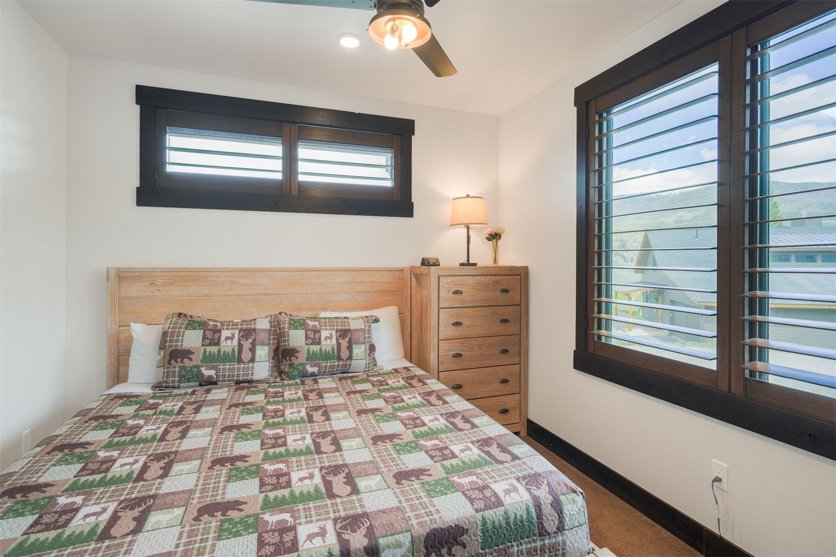21 Moss Way Silverthorne, CO 80498 - Photo 22 of 50 a bedroom with a bed and a window