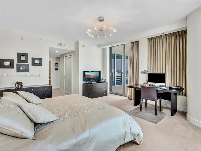 a bathroom with a shower and a sink