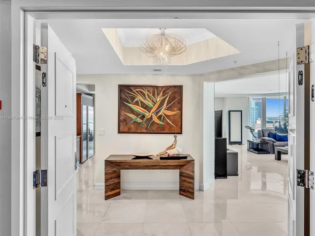 a view of kitchen with stainless steel appliances cabinets and a counter top