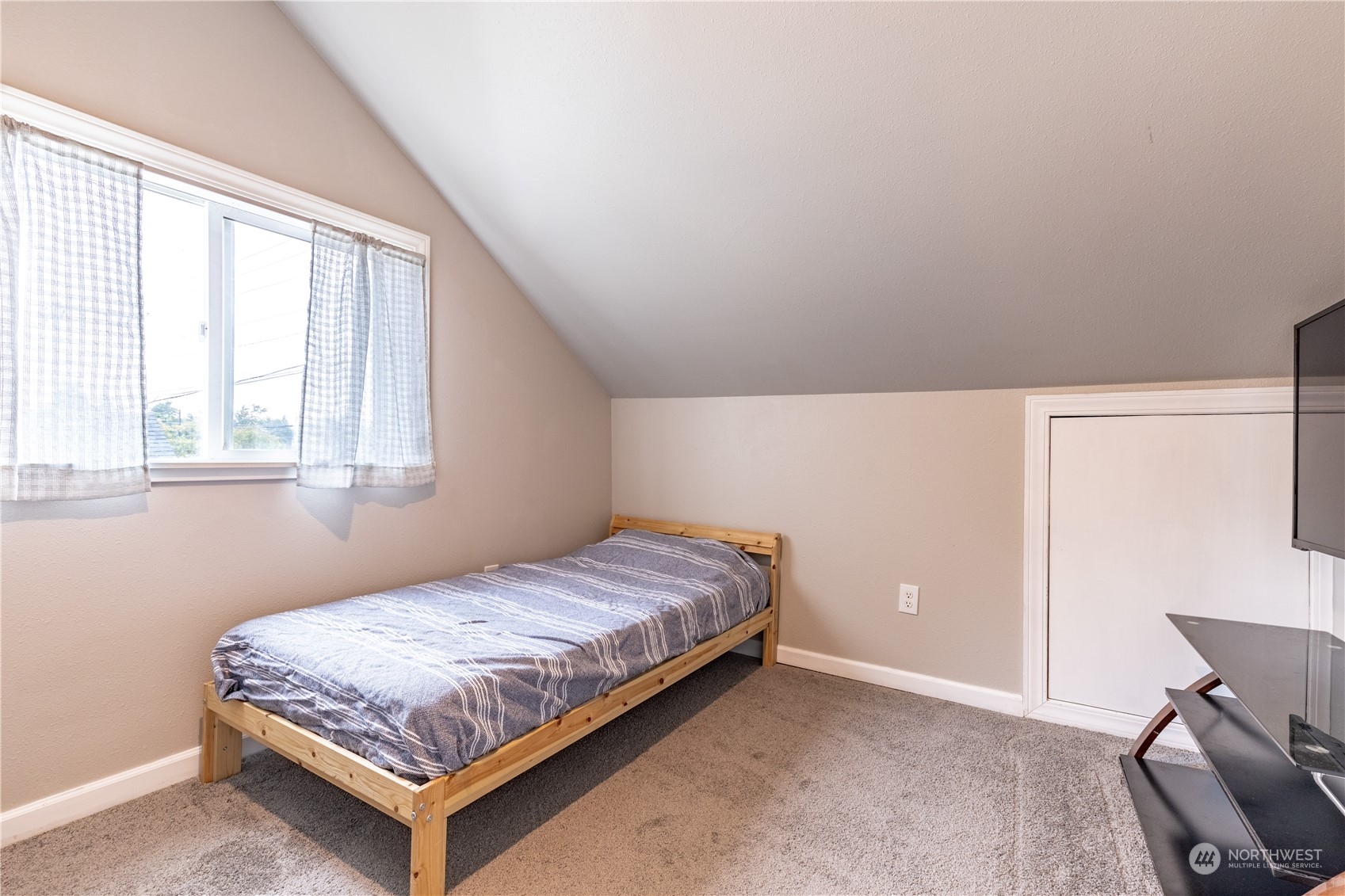 720 Greenleaf Avenue Burlington, WA 98233 - Photo 16 of 31 a bedroom with a bed and window