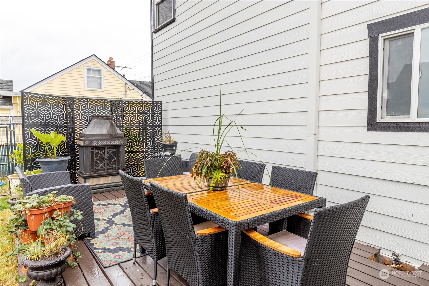 720 Greenleaf Avenue Burlington, WA 98233 - Photo 29 of 31 a view of a patio with table and chairs and potted plants