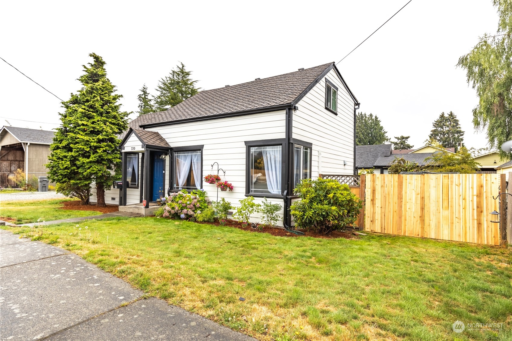 720 Greenleaf Avenue Burlington, WA 98233 - Photo 5 of 31 a front view of house with patio and garden