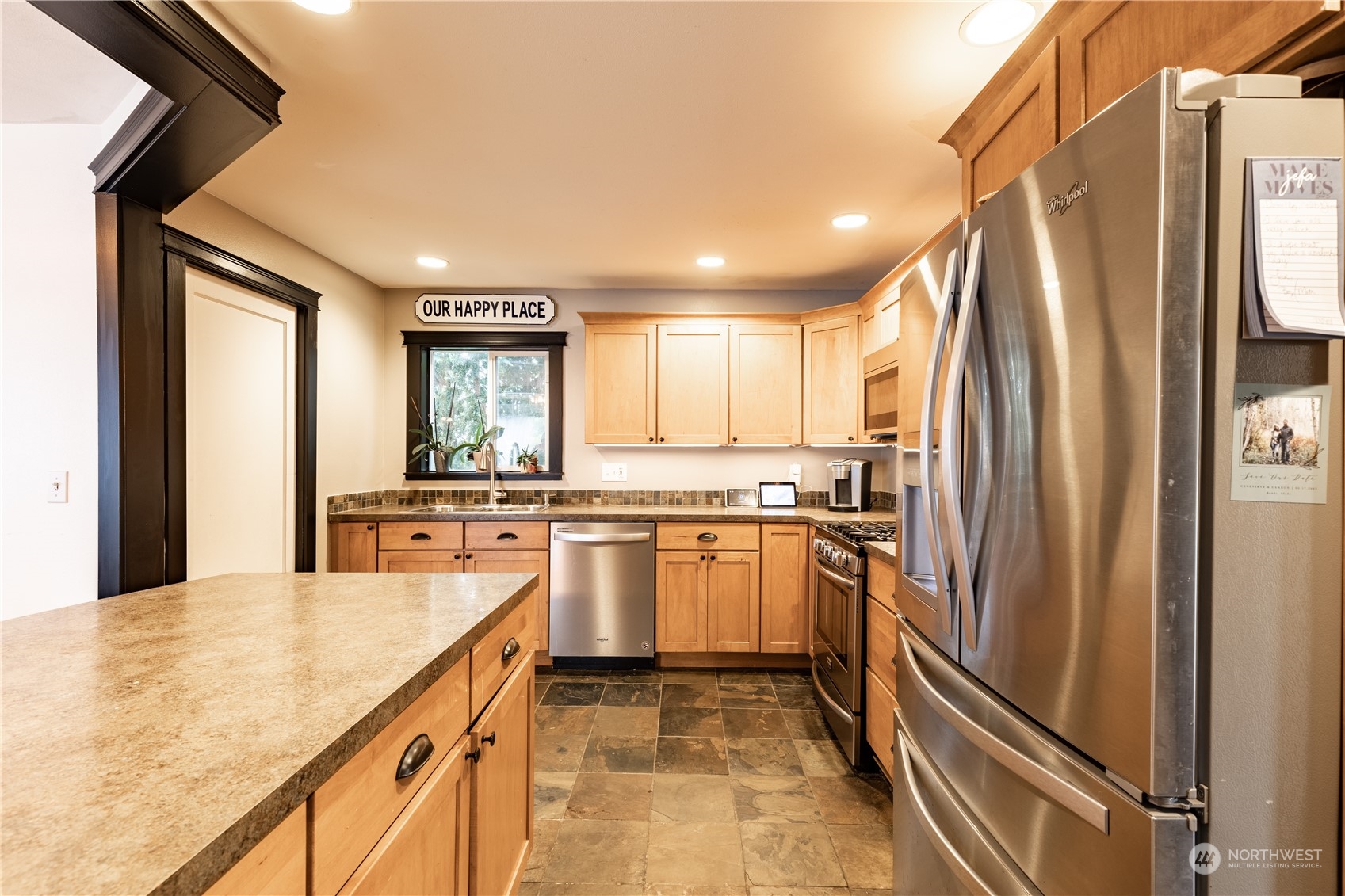 720 Greenleaf Avenue Burlington, WA 98233 - Photo 7 of 31 a kitchen with stainless steel appliances granite countertop a refrigerator and a sink
