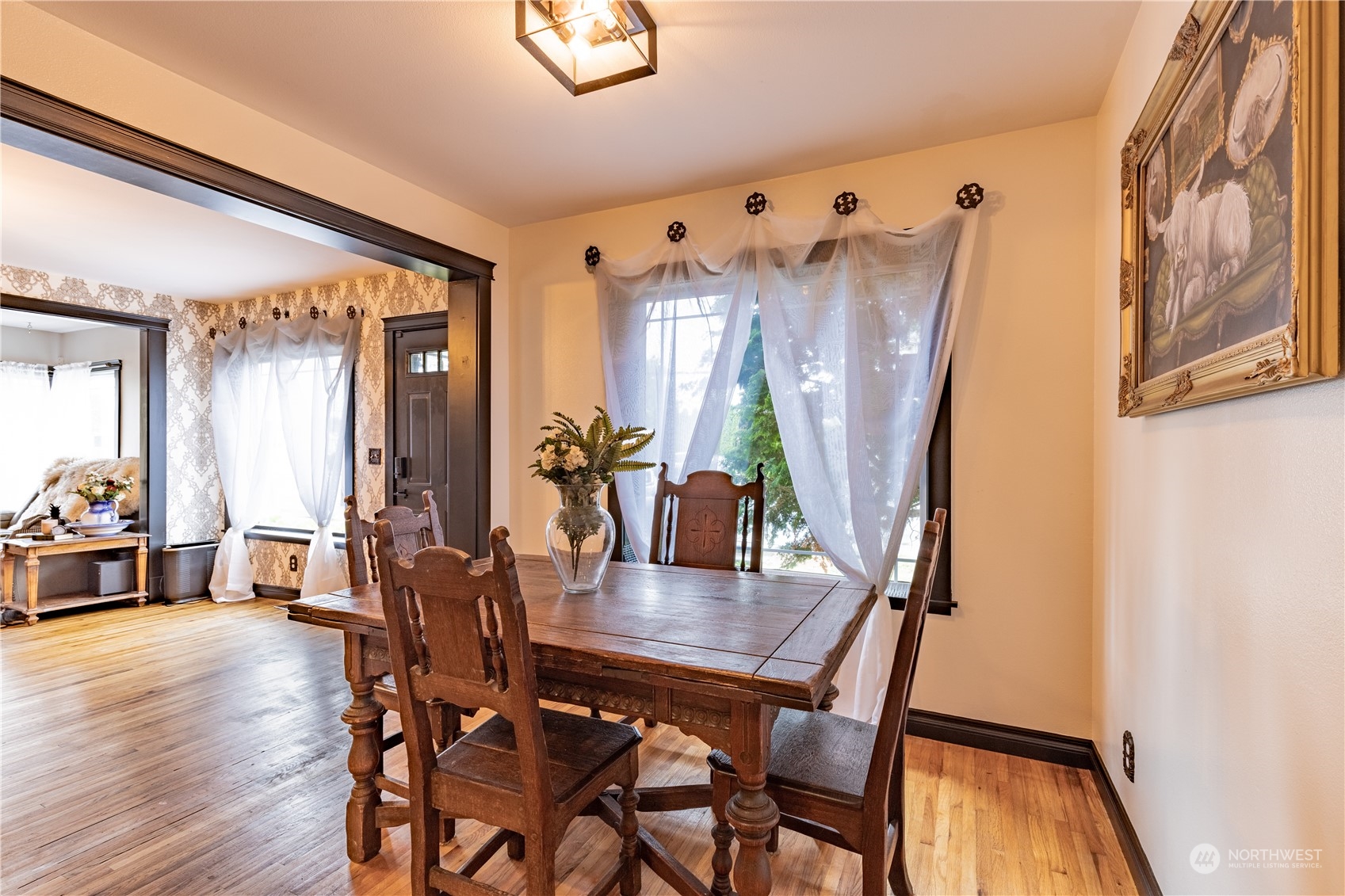 720 Greenleaf Avenue Burlington, WA 98233 - Photo 10 of 31 a view of a dining room with furniture and wooden floor