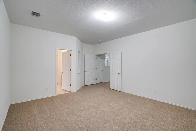 an empty room with an entryway