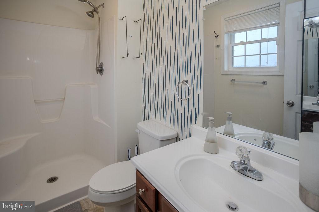 4482 Fort McCord Road Chambersburg, PA 17202 - Photo 29 of 47 a bathroom with a sink toilet and shower