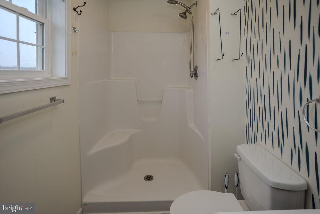 4482 Fort McCord Road Chambersburg, PA 17202 - Photo 30 of 47 a bathroom with a toilet and shower
