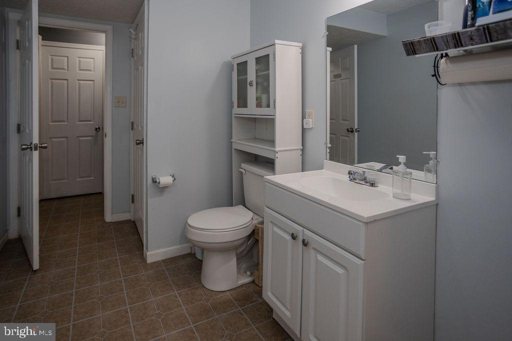 4482 Fort McCord Road Chambersburg, PA 17202 - Photo 36 of 47 a bathroom with a sink toilet and shower