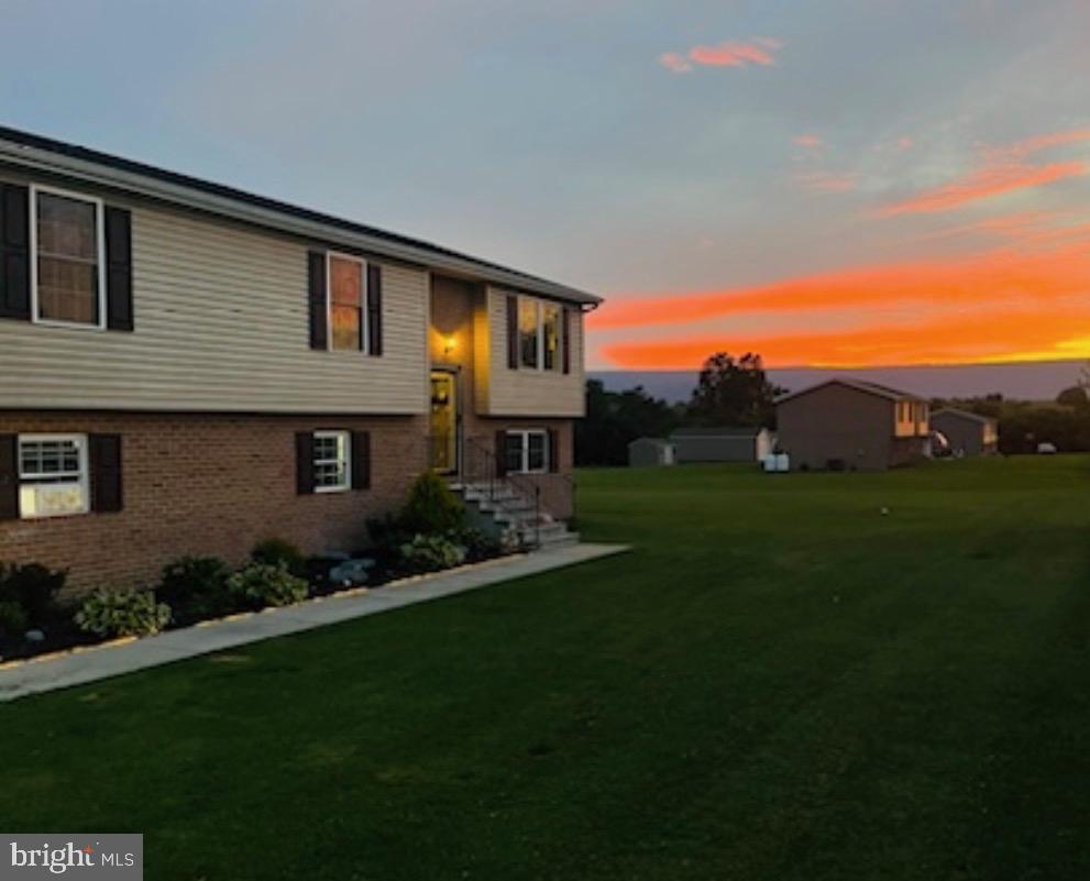 4482 Fort McCord Road Chambersburg, PA 17202 - Photo 4 of 47 a front view of a house with garden