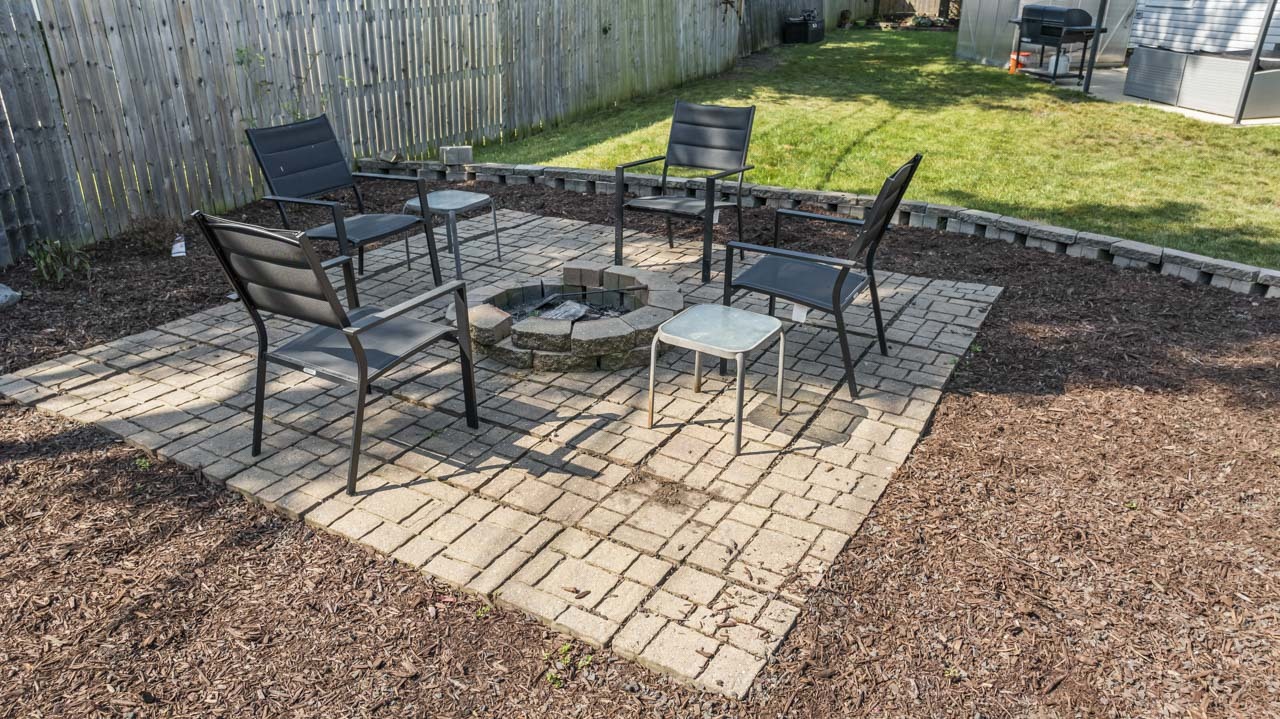 34 Spring Valley Lane Streamwood, IL 60107 - Photo 18 of 24 a view of a chairs and table in patio