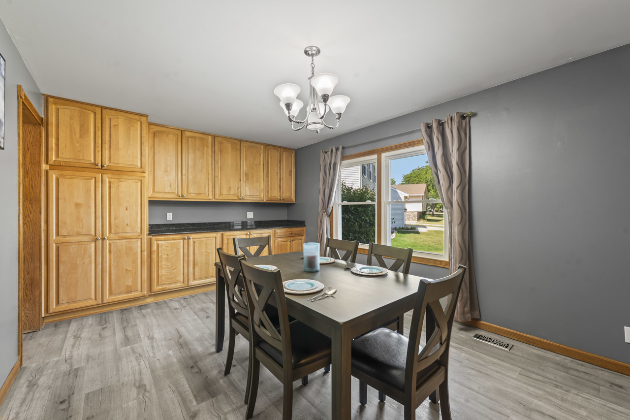 34 Spring Valley Lane Streamwood, IL 60107 - Photo 8 of 24 a view of a dining room with furniture window and outside view
