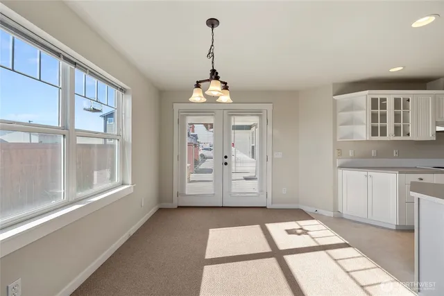 a view of an entryway with white walls