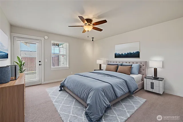 a bedroom with a bed and window