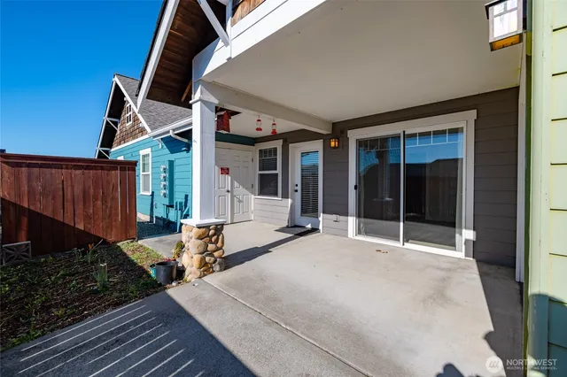 a backyard of a house with seating space