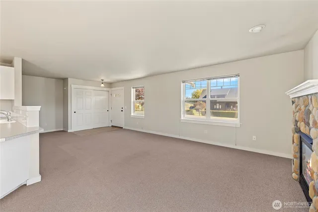 an empty room with windows