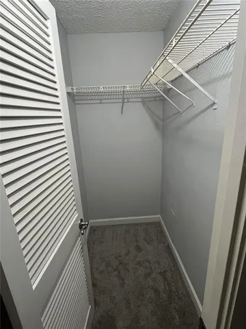 a view of a room with racks on the wall